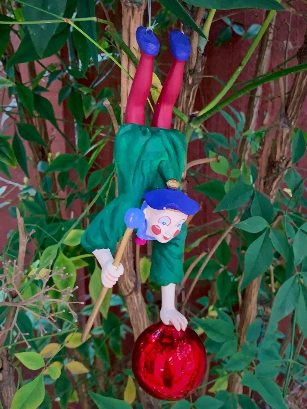 Hand-painted folk art ornament • Lightweight, carved-style construction